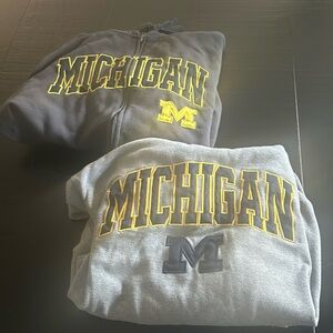 1 light grey hoodie and 1 Dark grey zip up Michigan Hoodie